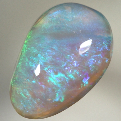 SOLID CRYSTAL OPAL Bright green fire in a 3 dimensional pattern